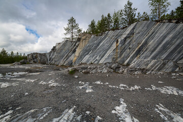 Italian marble quarry in Ruskeala mountain park - 757863307