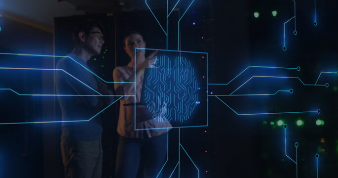Image of computer circuit board and digital brain over diverse workers in server room