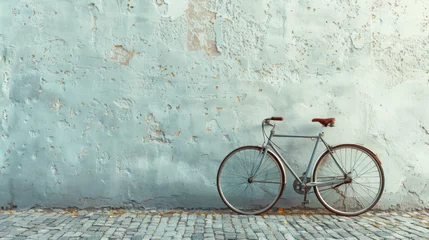 Poster A solitary bicycle leaning against a plain wall, symbolizing freedom and simplicity in transportation, © Lerson