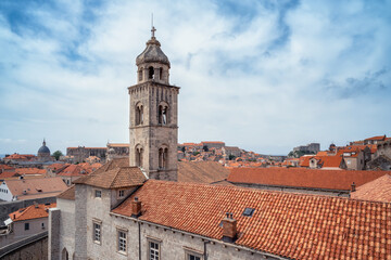 Amazing panoramic view of picturesque Dubrovnik old town, towers, narrow stone streets and buildings with red roofs on Adriatic sea coast, Croatia.