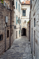 Romantic narrow stone alley with a tunnel in the center of the old town of Dubrovnik, Croatia - 757870186
