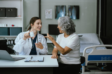 Medicine, healthcare and people concept, Pharmacists or doctors giving explanation about medicine to patient in clinic.