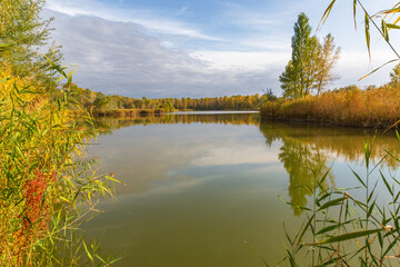 autumn day on lake - 757875367