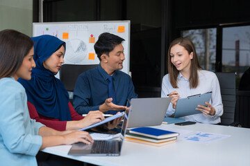 Business team to calculate financial information to invest in new projects. financial manager meeting.euing Smart phone and laptop and digital tablet PCs in office.