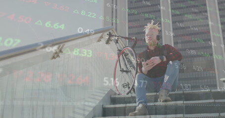 Image of financial data and graphs over african american albino man with bike