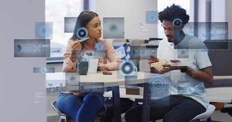 Image of data processing with scope scanning over diverse business people working at office