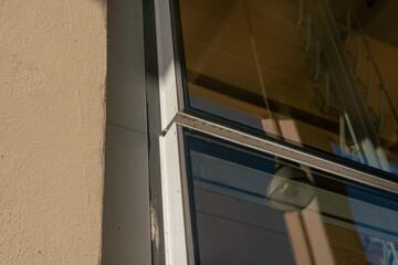 particular high efficiency window, detail of the double glazing on a building with continuous...