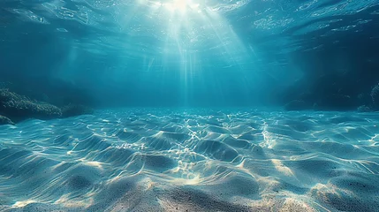 Tuinposter Seabed sand with blue tropical ocean above, empty underwater background with the summer sun shining brightly, creating ripples in the calm sea water © Jennifer