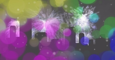 Image of colourful spots over white new year fireworks exploding and silhouetted cityscape