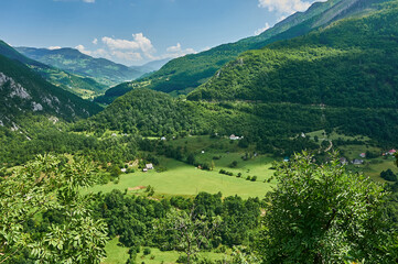 Montenegro. Valley of Tara riverbed. Mountains and forests on the slopes of the mountains.
