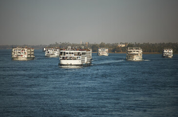 Cruise ships on the Nile. Summer trip. Popular way for tourists to see ancient Egypt. Vacation destination - 757907977