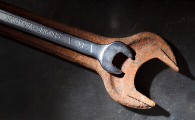Rusted and stainless wrenches