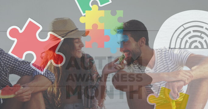 Image of colourful puzzle pieces and autism text over happy friends at summer beach party
