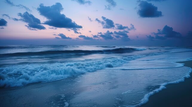 The soothing waves of a serene ocean captured at dusk, embodying the calmness of nature's rhythm.