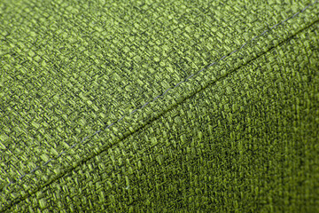 Textured green furniture fabric with stitching