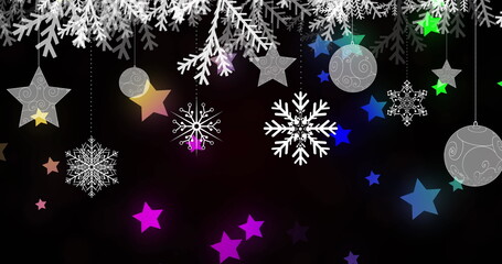 Image of christmas decoration over colorful glowing stars