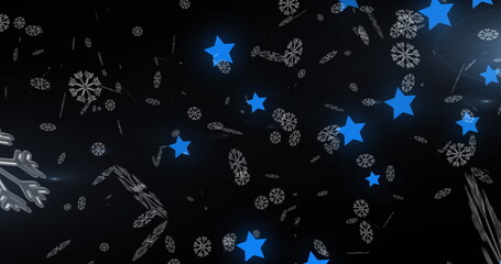 Obraz premium Image of snow falling over blue glowing stars