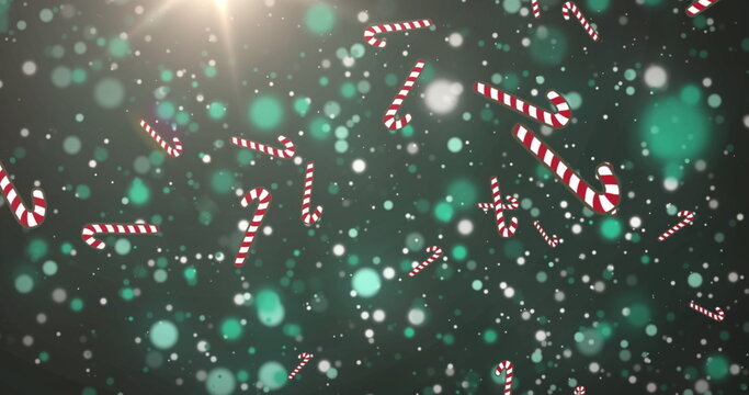 Naklejki Image of candy cane falling over grey dots