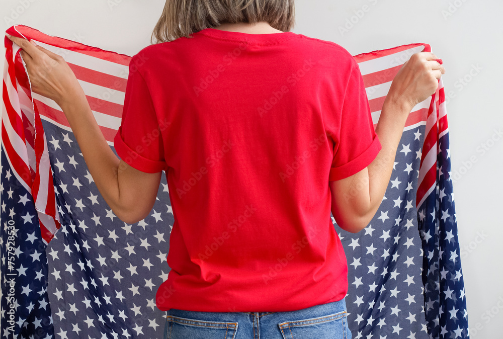 Poster 4th of July USA Independence Day , Girl Back red  t shirt mock up. Copy space blank back red t-shirt model. Celebration memorial day in America.	