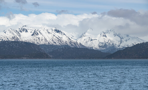 The mountains of Lake Clark National Park and Preserve from the Kenai Peninsular across the Cook Inlet. Alaska USA