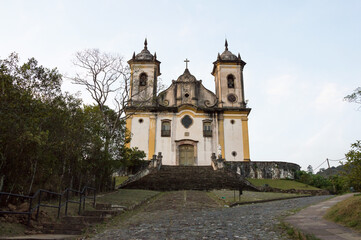 Fototapeta na wymiar Image shows the facade of the Church of São Francisco de Paula in Ouro Preto in the late afternoon