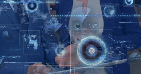 Image of data processing with scope scanning over diverse workers using tablet in warehouse