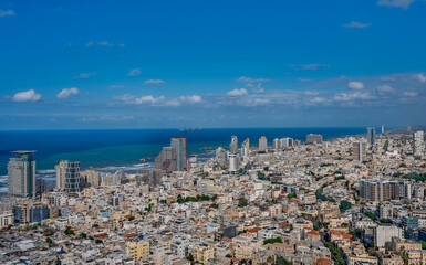 Tel Aviv old buildings, waterfront hotels and Mediterranean Sea.