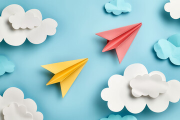 Bright Paper Airplanes and Clouds on Blue Background - Creative Concept
