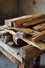 Fototapeta na wymiar Stack of Wood on Wooden Table