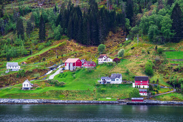 Mountains and Fjord over Norwegian Village in Olden, Innvikfjorden, Norway