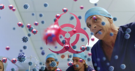 Medical team fights COVID-19 in hospital, depicted with virus icons.