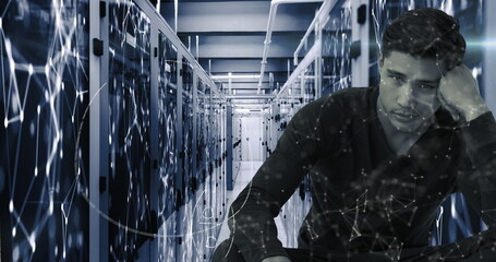 Digital composite of man with math and molecules in server room symbolizes global network.