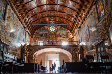 Black contrast of silhouettes and light inside the Our Lady of Amparo church in tiles, Válega -...