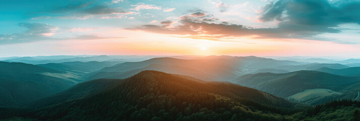 landscape panorama of misty mountains, view into the distance, forests, dawn in the sky, view from the top, aerial photography, for a banner - obrazy, fototapety, plakaty