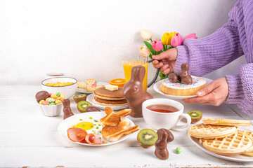 Easter holiday sweet breakfast, brunch. Easter decorated belgian waffles, pancakes, breakfast...