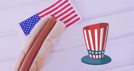 Image of hot dog and hat in usa flag colours over white surface