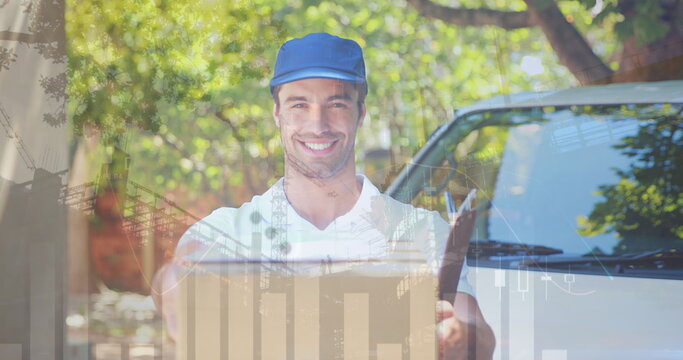 Image of financial data over happy caucasian male courier holding package