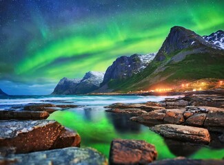 Aurora borealis on the Lofoten islands, Norway. Night sky with polar lights. Night winter.