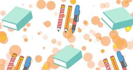 Image of orange spots over pen, pencils and blue books