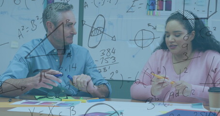 Image of financial data processing over diverse business people in office