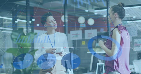 Image of financial data processing over diverse business people in office