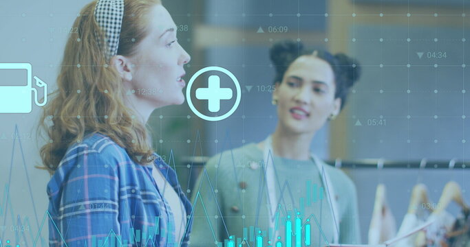 Image of financial data processing over diverse business people in office