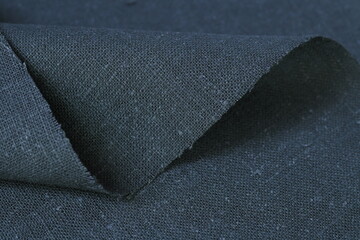 dark gray hemp viscose natural fabric cloth color; sackcloth rough texture of textile fashion...