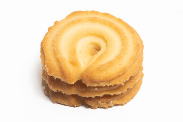 Stacked of danish butter cookies the vanilla ring cookie isolated on white background clipping path