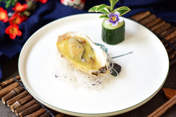 Seafood cheese oysters placed on a plate