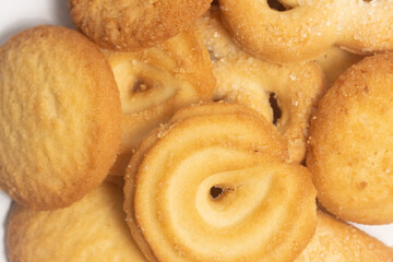Close-up group of assorted of danish butter cookies isolated on white background clipping path