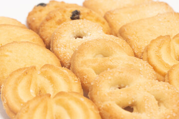 Close-up group of assorted of danish butter cookies isolated on white background clipping path