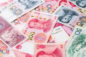Close-up of Chinese RMB banknotes as a background - obrazy, fototapety, plakaty