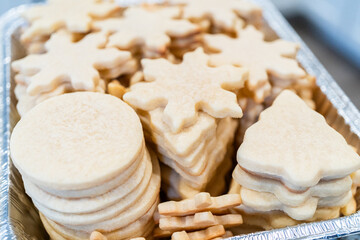 Baking Snowflake-Shaped Sugar Cookies for Homemade Christmas Gifts