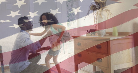 Image of flag of united states of america over african american father and daughter hugging